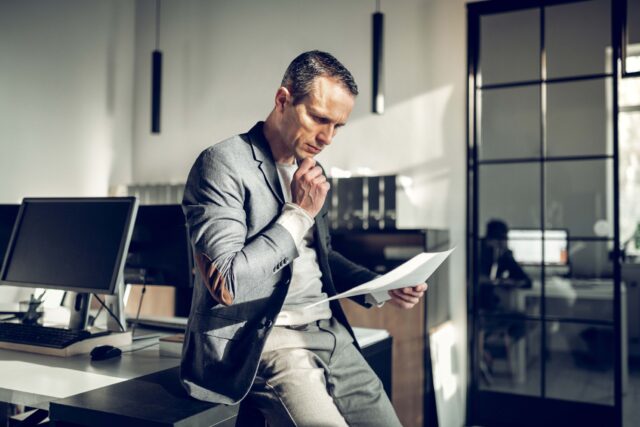 business man reading documents