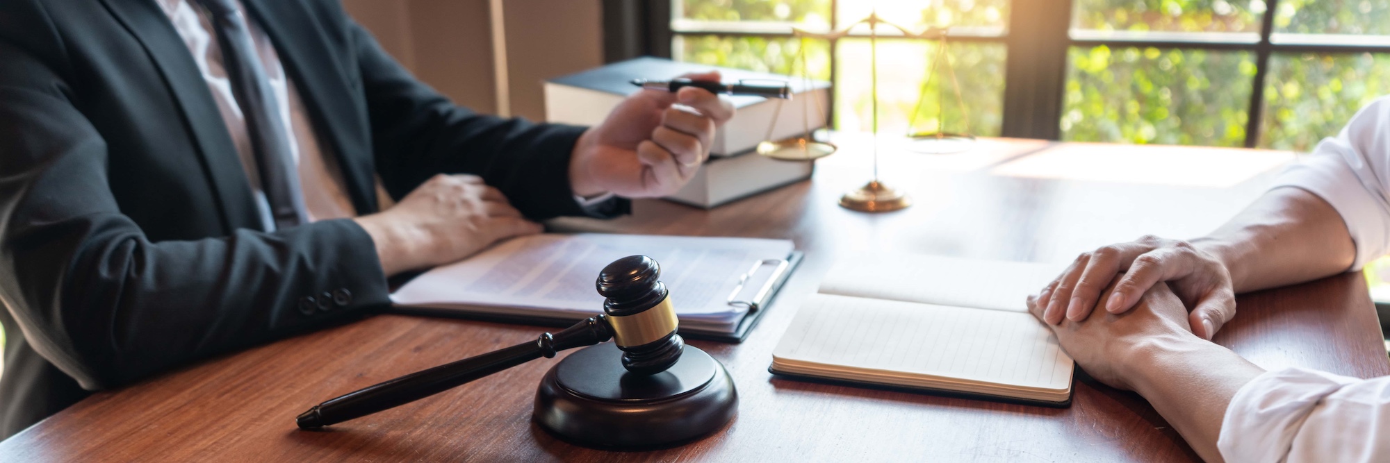 Male Notary lawyer or judge consult or discussing contract papers with Businessman client in office