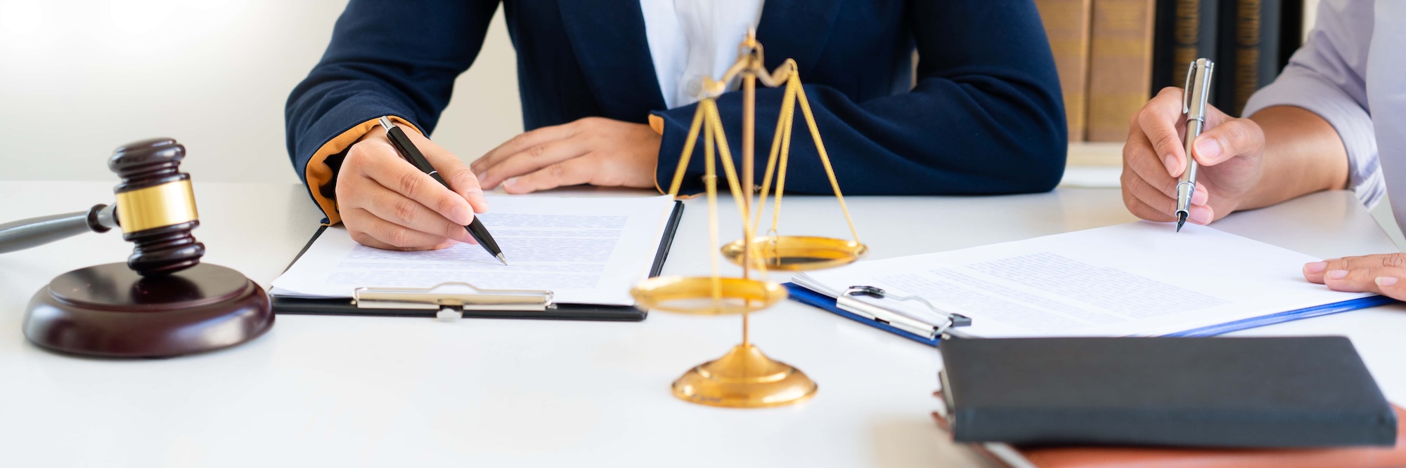 Women lawyer discussing with clients in courtroom. justice and law attorney court judge meeting concept