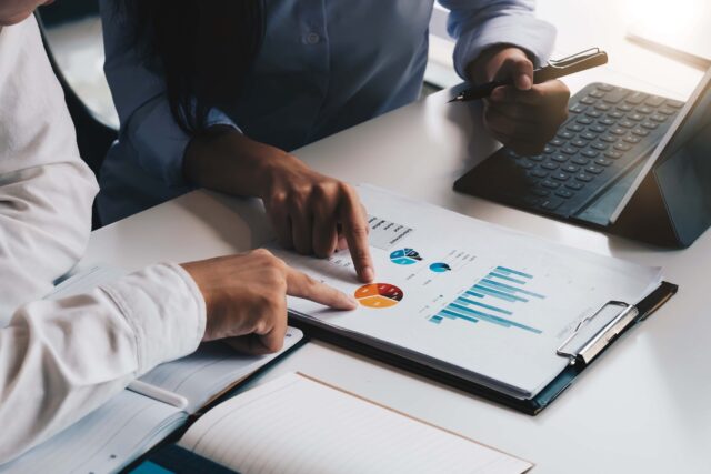 people studying a credit report