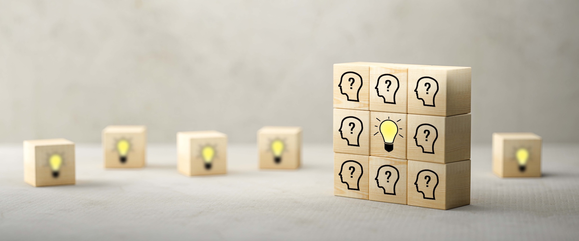 cubes showing a brainstorming session on concrete background