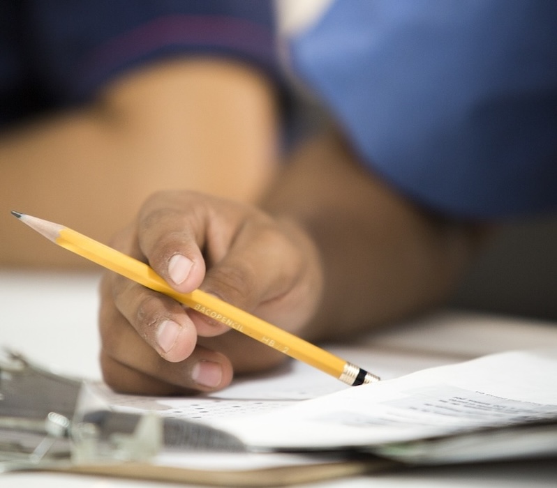 hand holding pencil