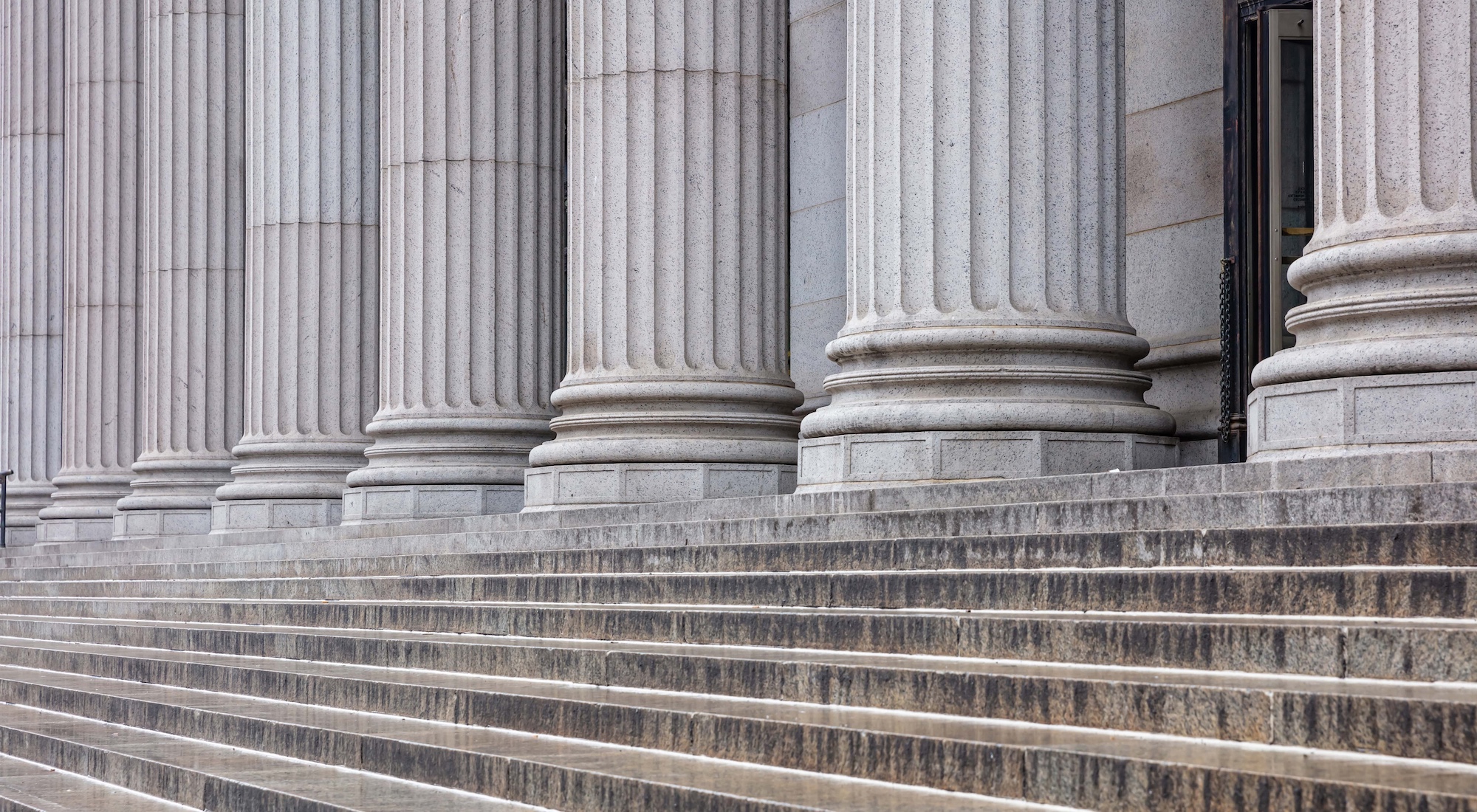 marble steps leading up to columns
