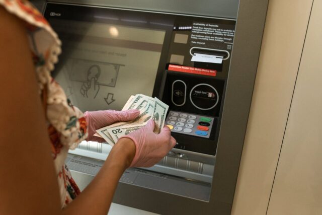 person using an ATM